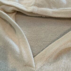 Cozy hooded Sweater in a soft cream